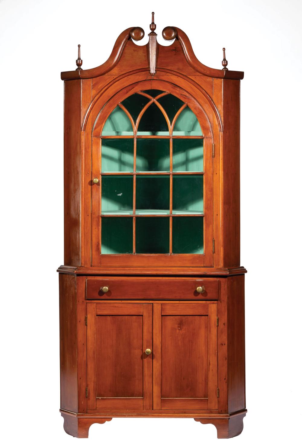 Appraisal: American Cherrywood Two-Part Corner Cupboard Mid Atlantic broken scroll pediment