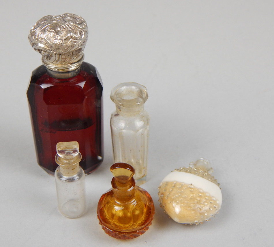 Appraisal: Various scent bottles to include a ruby tinted bottle with