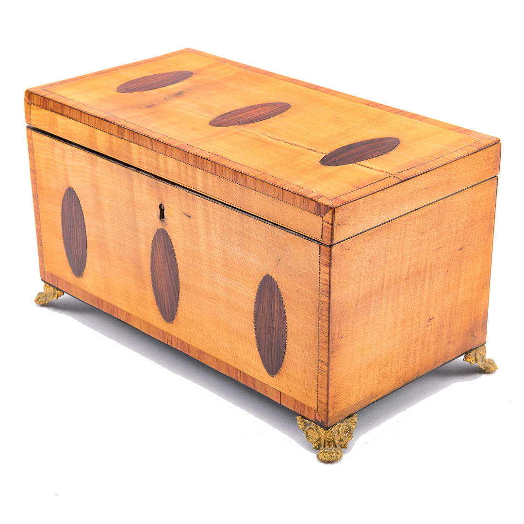 Appraisal: Regency satinwood inlaid tea caddy circa with inlaid rosewood oval