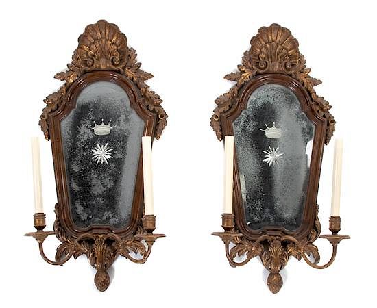 Appraisal: A Pair of Italian Rococo Style Parcel-Gilt Walnut Sconces A