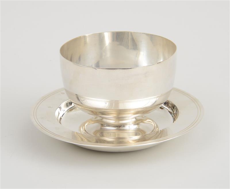 Appraisal: ENGLISH SILVER MILLENIUM DISH AND A SILVER FOOTED CUP The