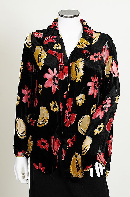 Appraisal: A s black velvet jacket with a chiffon floral pattern