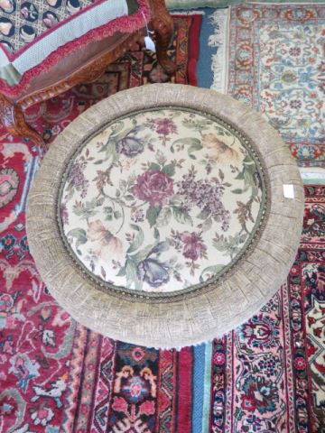 Appraisal: Round Ottoman floral tapestry with heather green chenille trim diameter