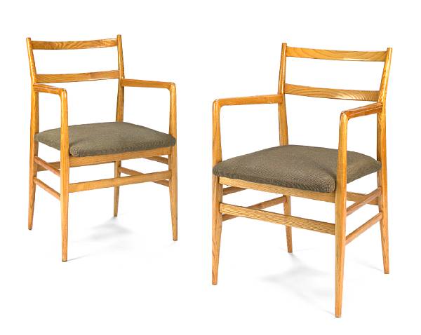 Appraisal: A pair of Gio Ponti upholstered oak armchairs for Cassina