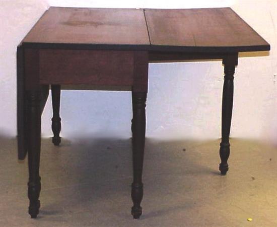 Appraisal: Dropleaf dining table early th C six turned legs with