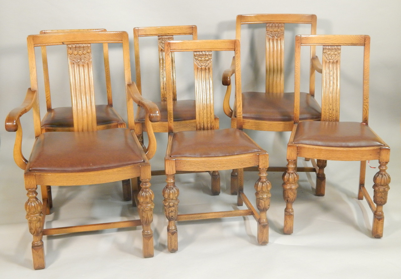 Appraisal: A set of six mid thC oak dining chairs each