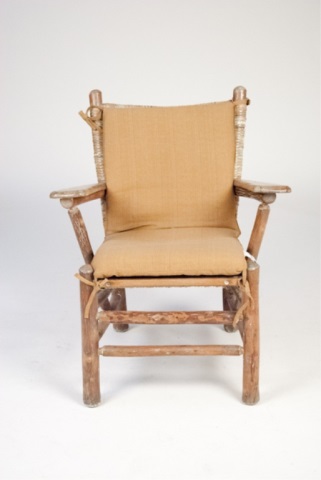 Appraisal: Rustic Armchair with Cushions Pine and mixed woods Traces of