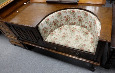 Appraisal: Dark oak priory style telephone table with integral seat