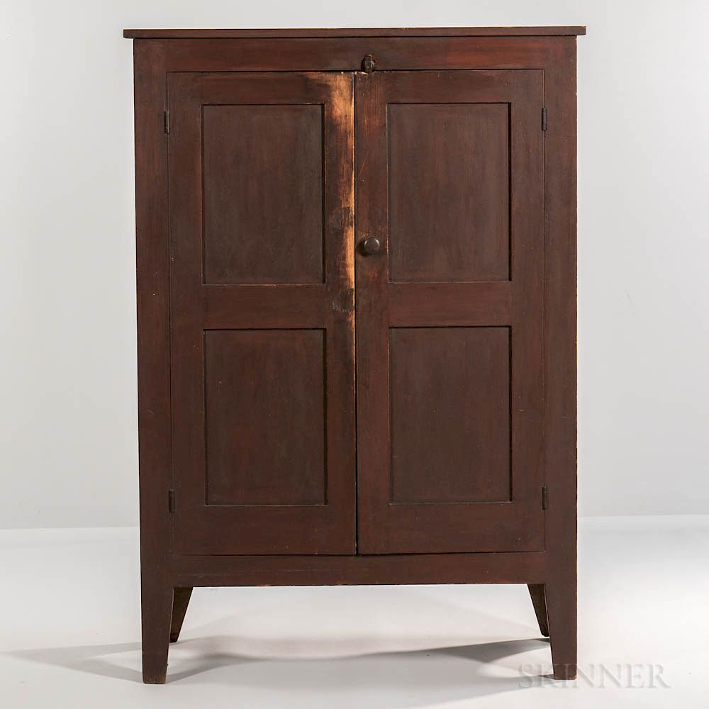 Appraisal: Red Brown-painted Cupboard Red Brown-painted Cupboard early th century the