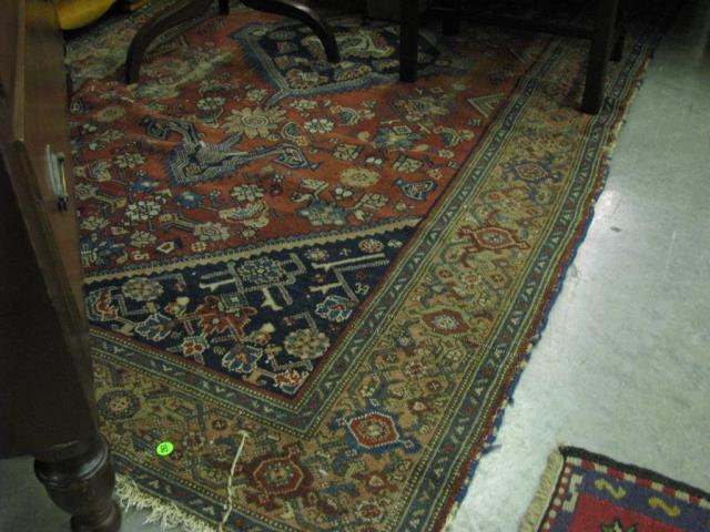 Appraisal: An antique Oriental area rug geometric tribal figures in open