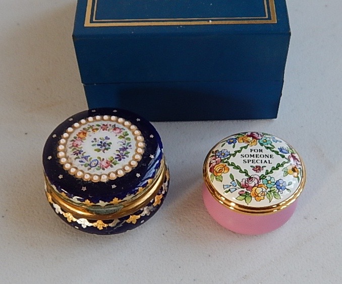 Appraisal: Two enamelled pill boxes including one by Halcyon Days