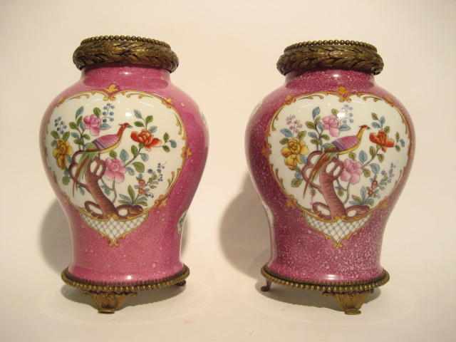 Appraisal: A pair of gilt bronze mounted porcelain urns height in