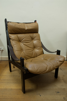 Appraisal: THREE DANISH LEATHER UPHOLSTERED ARM CHAIRS