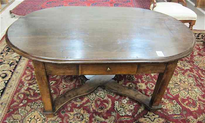 Appraisal: OVAL WALNUT COFFEE TABLE French th century the oval top