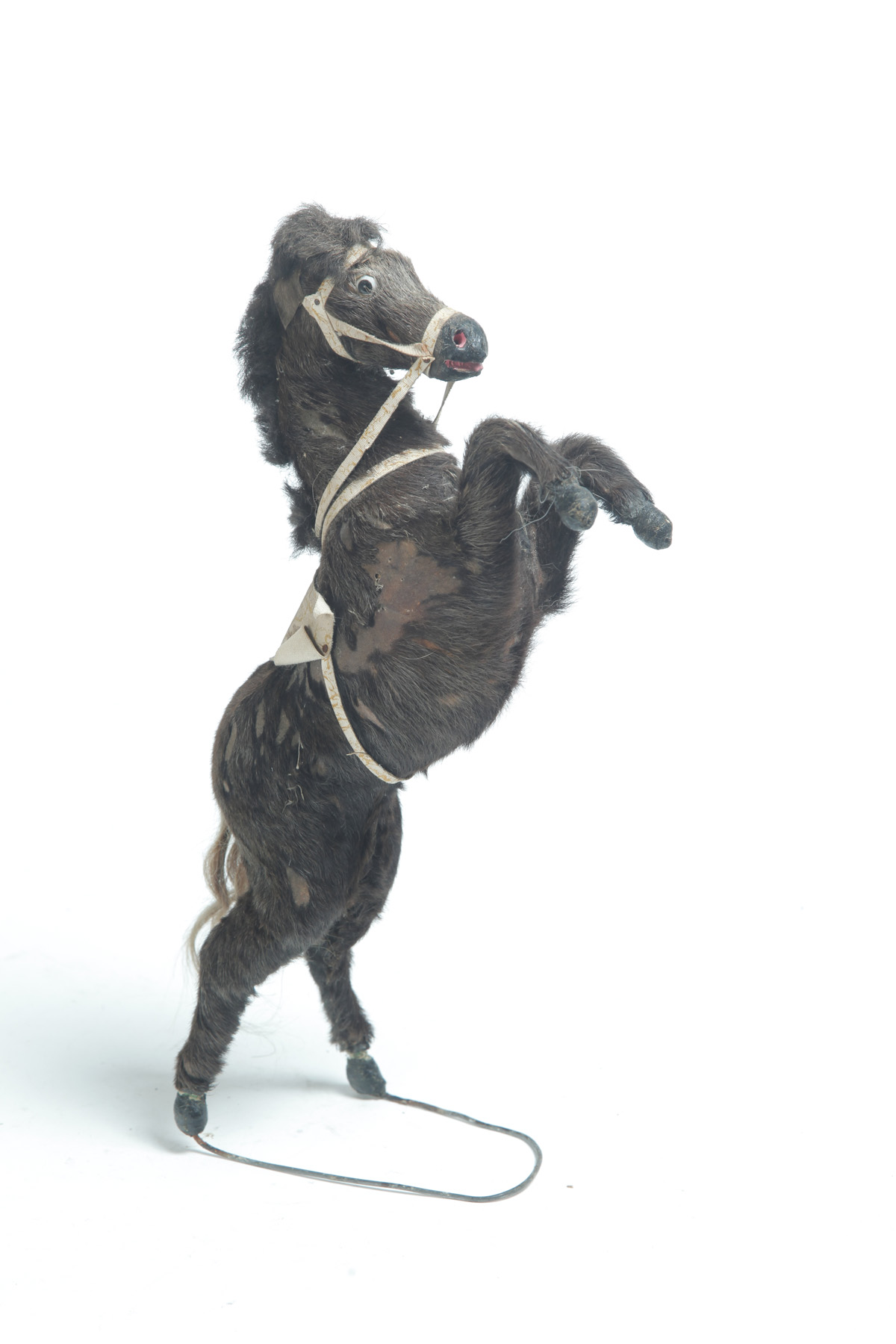 Appraisal: AMERICAN WIND UP HORSE TOY Early th century Rearing horse