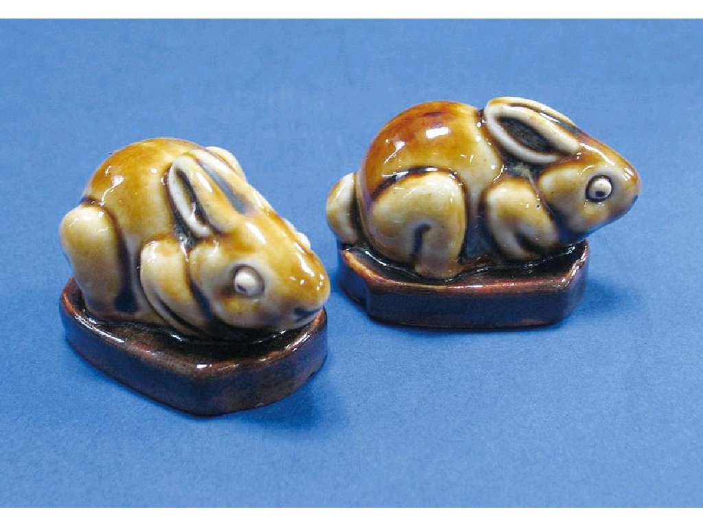 Appraisal: A PAIR OF ROYAL DOULTON MINIATURE MODELS of rabbits seated