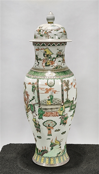 Appraisal: Tall Chinese enameled porcelain covered vase depicting figures in various