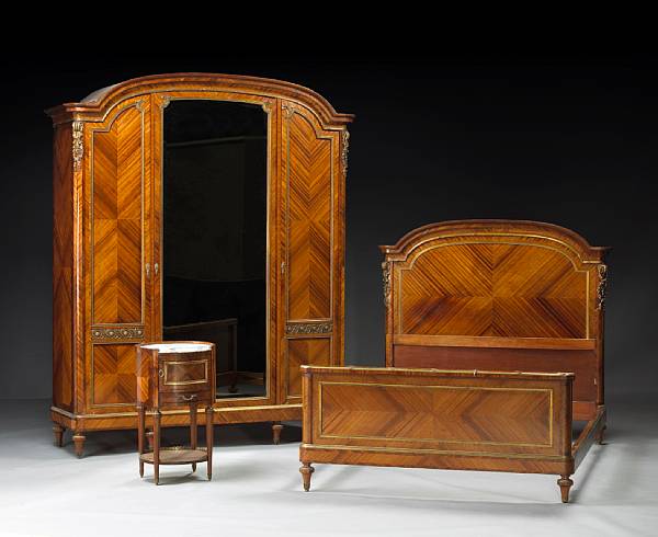 Appraisal: A Louis XVI style gilt bronze mounted mahogany and kingwood