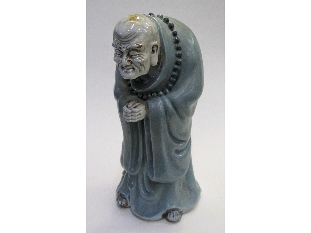 Appraisal: Japanese pottery figure of a robed sage