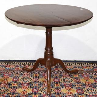 Appraisal: George III walnut tilt top tea table having a circular