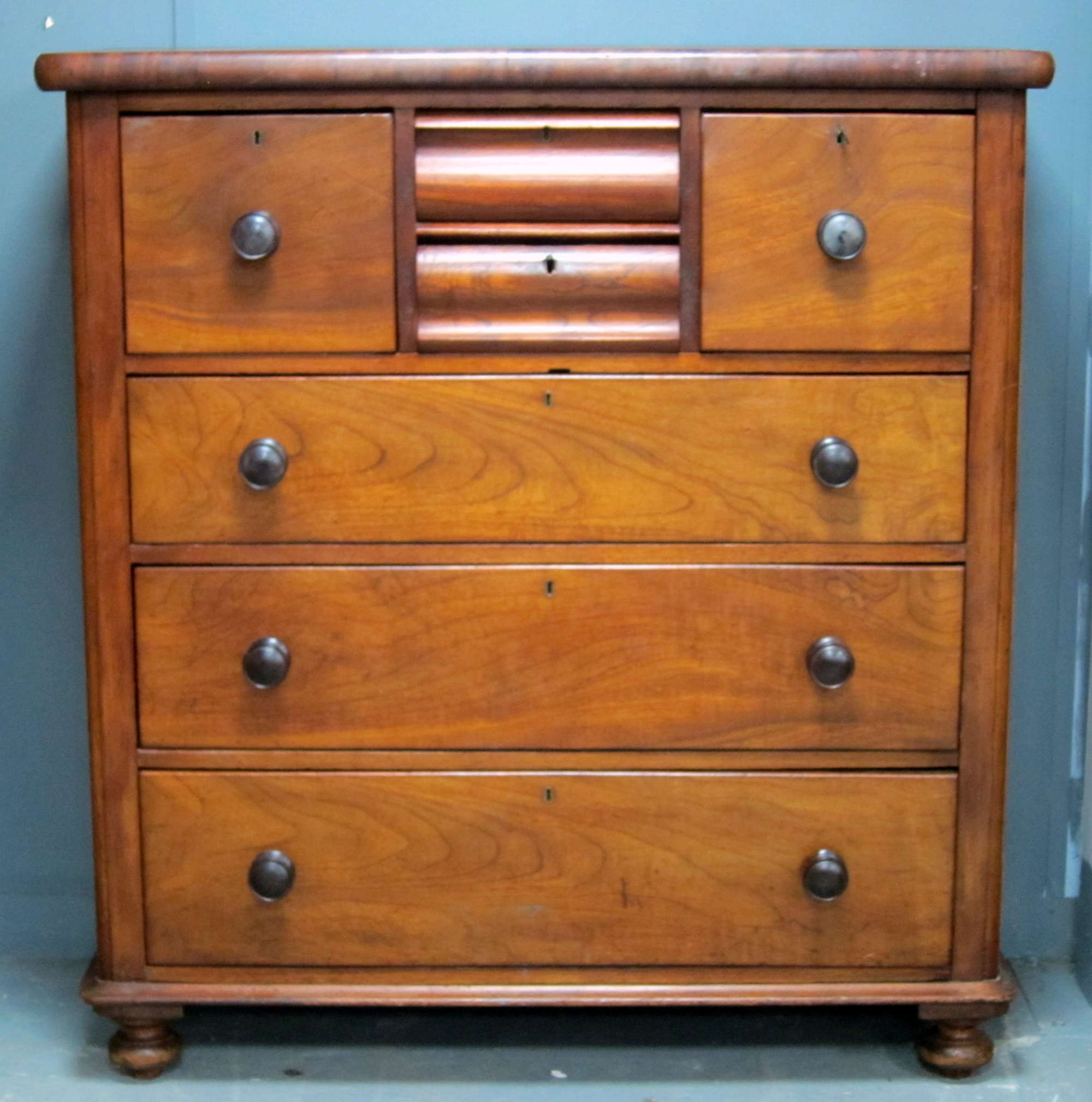 Appraisal: Victorian mahogany chest of two hat drawers over three long