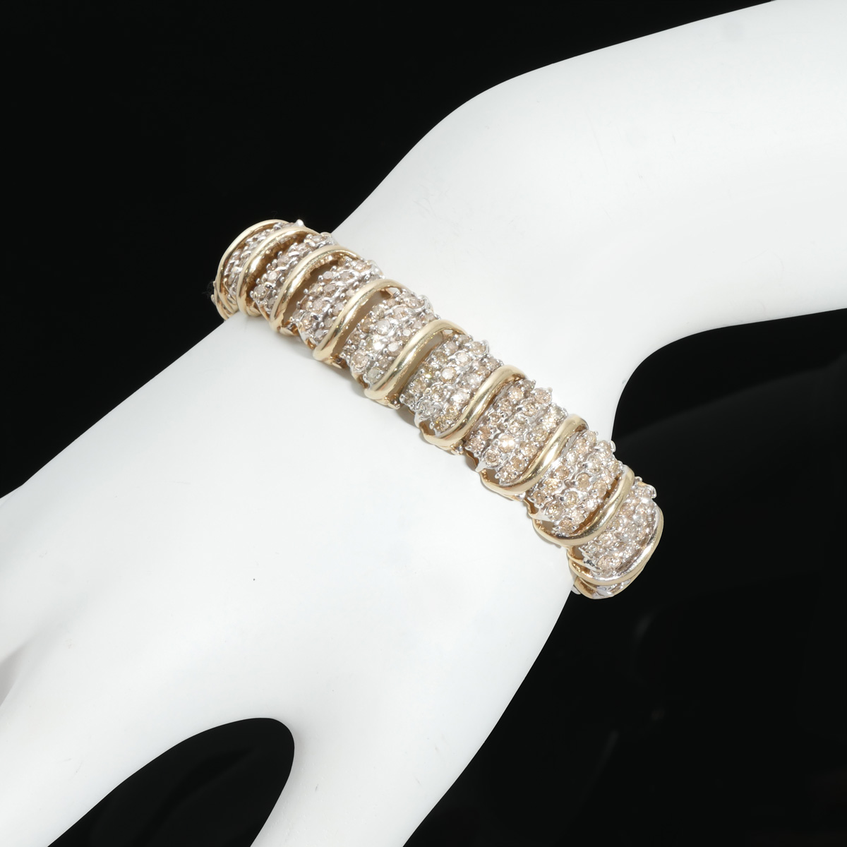 Appraisal: WIDE K CTW DIAMOND BRACELET K yellow gold bracelet contains