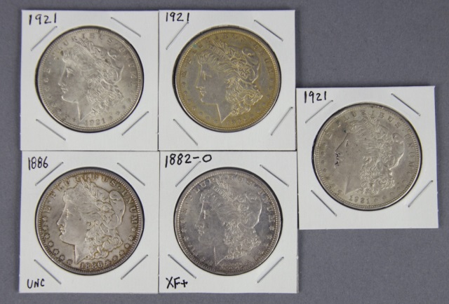 Appraisal: Five Morgan DollarsGrading AU-BU Dates include -O and four coins