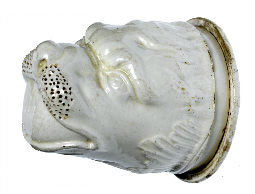 Appraisal: A CREAMWARE LION'S HEAD BOX AND COVER the threaded cover