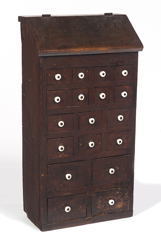 Appraisal: AMERICAN SLANT LID APOTHECARY Ca mixed woods Eighteen drawer apothecary