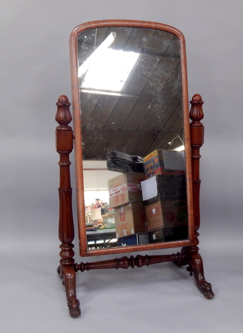 Appraisal: A Victorian mahogany robing mirror with a swing front mirror