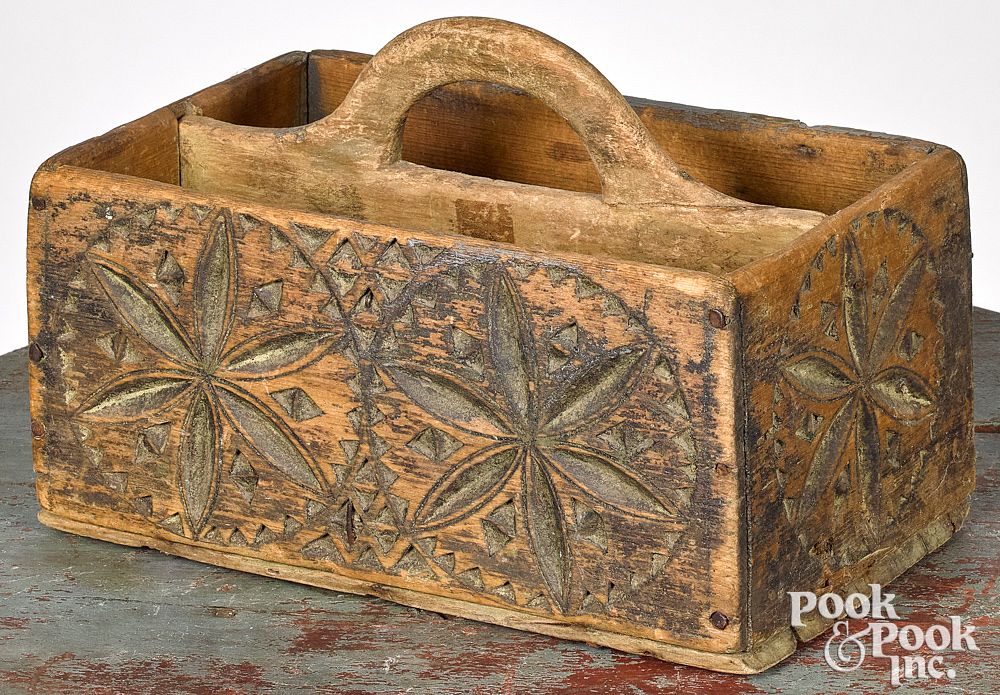 Appraisal: Carved and painted pine utility carrier Carved and painted pine