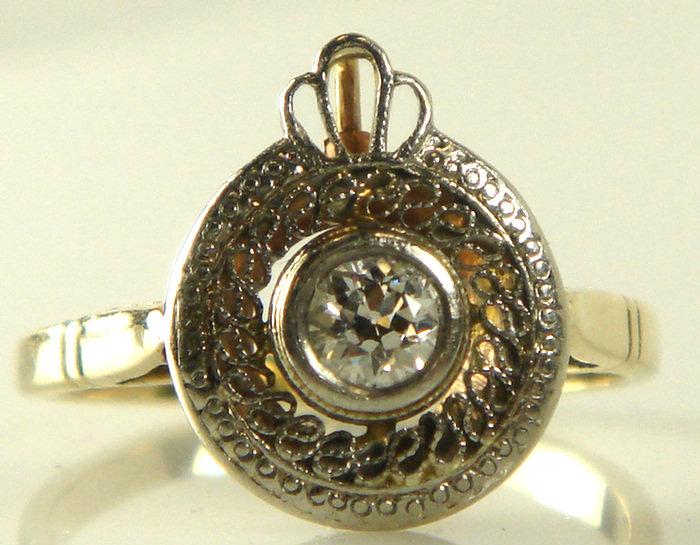 Appraisal: K YG diamond ring about - pt stone round Edwardian