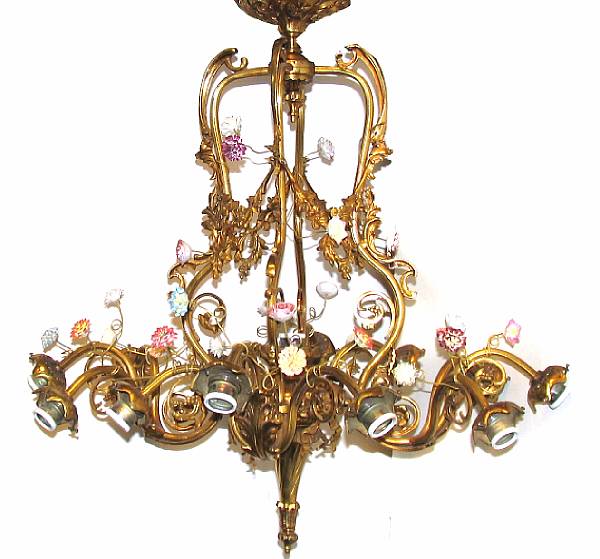 Appraisal: A Louis XV style gilt bronze and porcelain twelve light