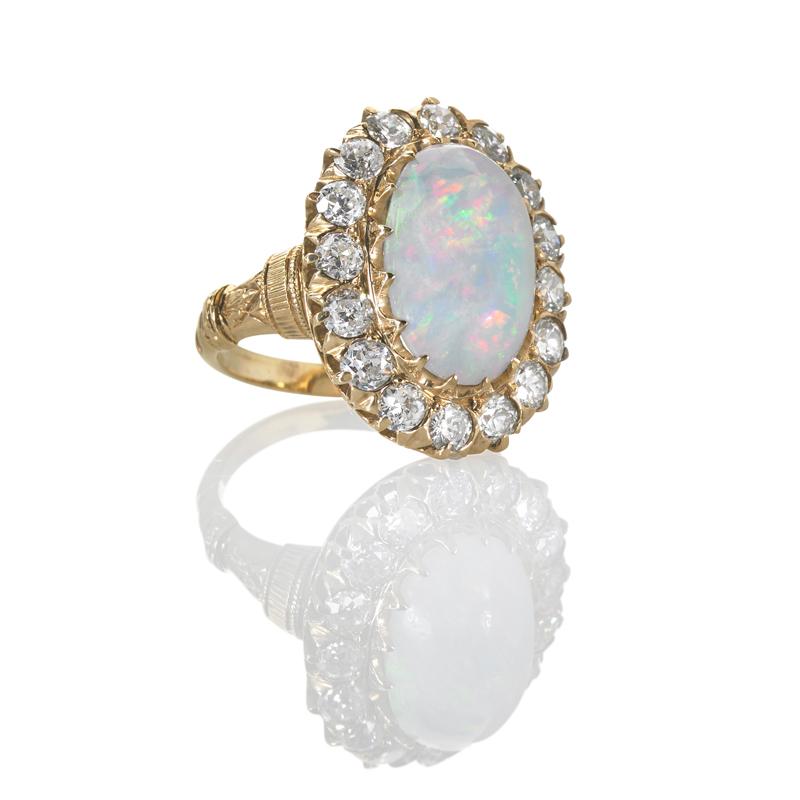 Appraisal: OPAL AND DIAMOND OVAL CLUSTER K GOLD RING Condition Report