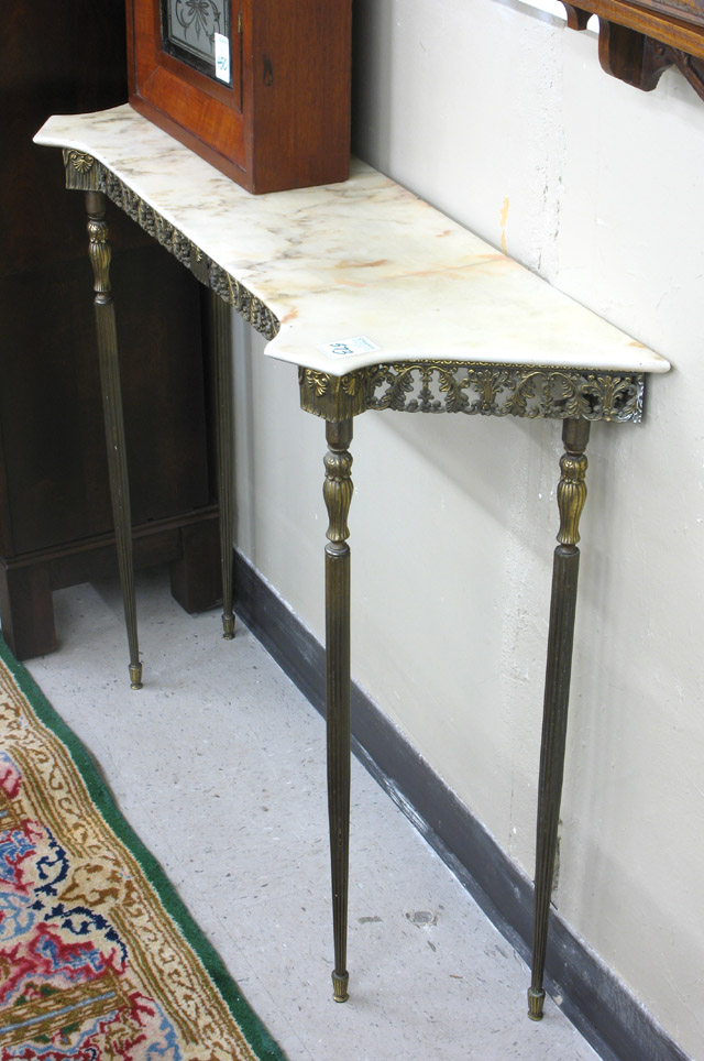 Appraisal: MARBLE-TOPPED CONSOLE TABLE Italian th century having a brassed metal