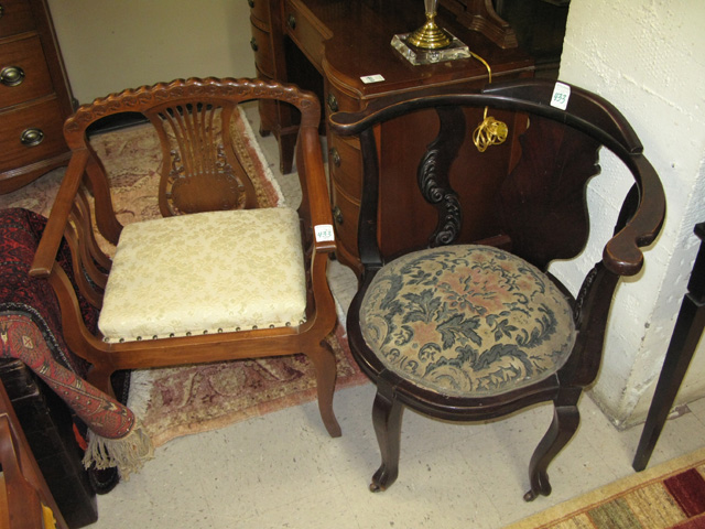 Appraisal: TWO LATE VICTORIAN MAHOGANY ARMCHAIRS American c the lighter finish