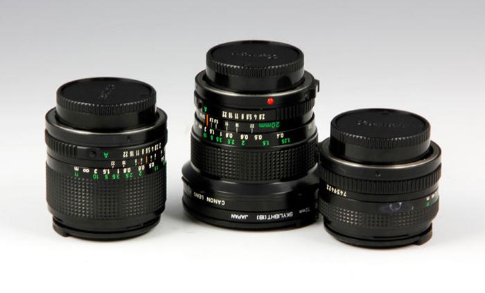 Appraisal: - Collection of Canon Lenses Collection of three Canon lenses