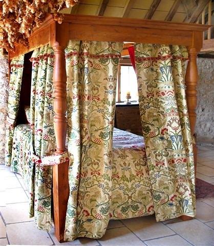 Appraisal: A modern solid yew wood four poster bed with panelled