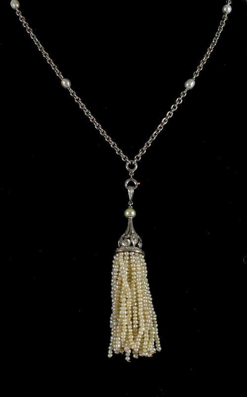 Appraisal: A diamond and seed pearl tassel pendant on an unmarked