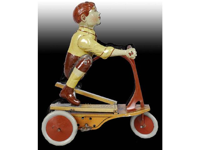 Appraisal: Tin German Fisher Oh Boy Scooter Toy Description Wind-up Working