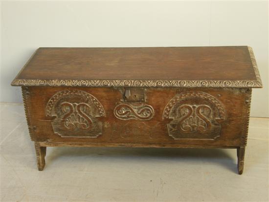 Appraisal: th century carved oak coffer of plank construction h w