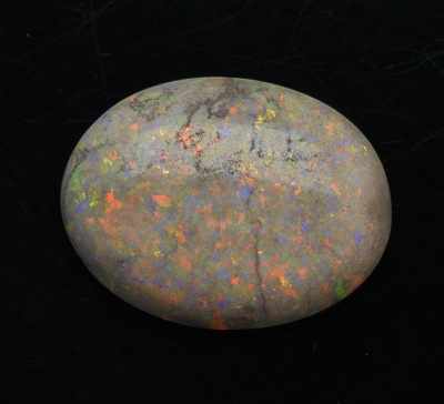 Appraisal: An Unmounted Carat Australian Opal UGL Certified Oval cabochon cut