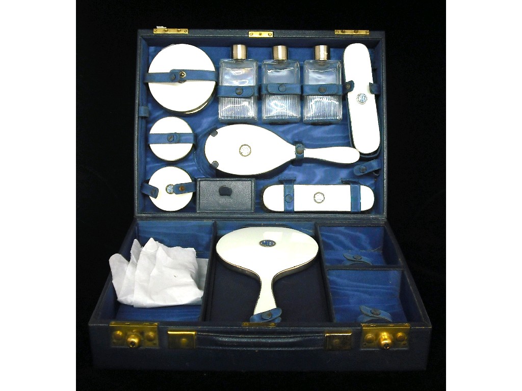 Appraisal: Good engine turned white enamel dressing table set by Asprey