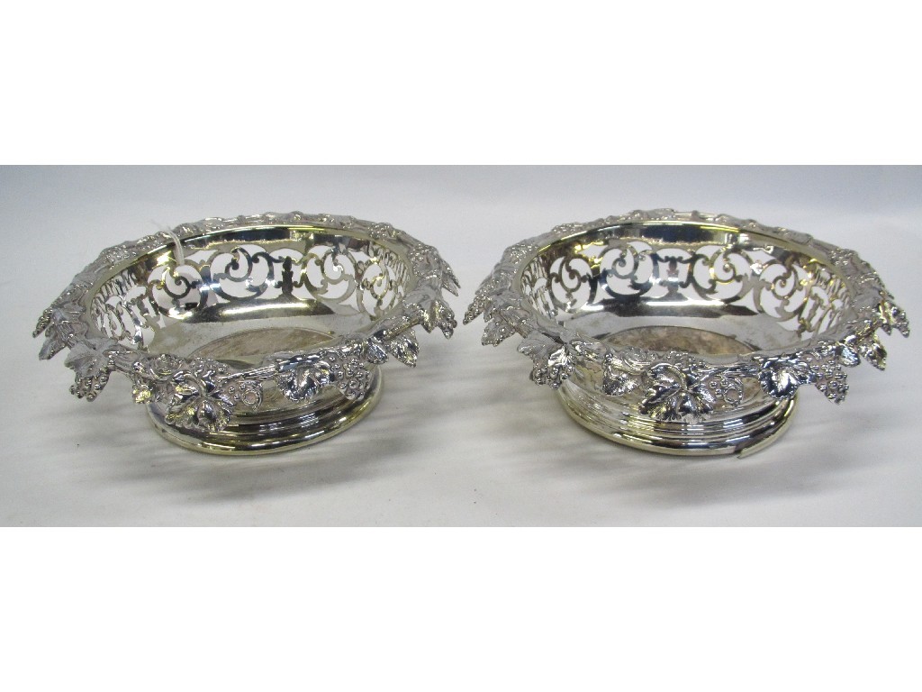 Appraisal: Pair of silver plated wine coasters