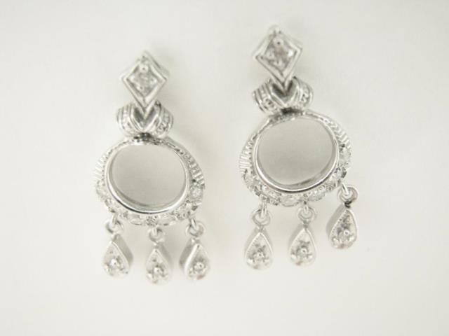 Appraisal: A pair of K white gold dangle earrings with ct