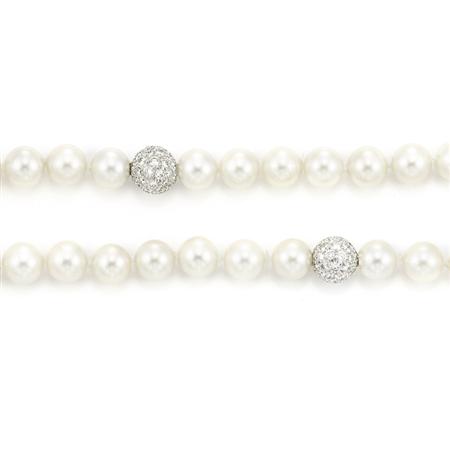 Appraisal: Single Double Strand Cultured Pearl Necklace with Diamond Ball Clasps