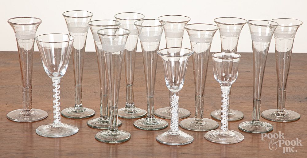 Appraisal: Thirteen glass champagne flutes h Thirteen glass champagne flutes h