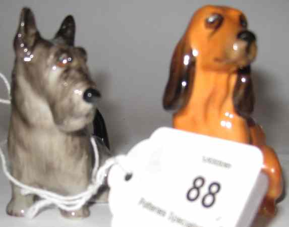 Appraisal: Royal Doulton Seated Terrier K and Seated Dog with Bandaged