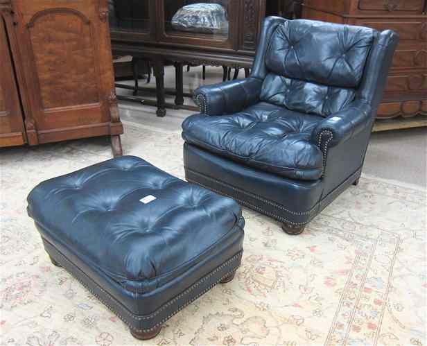 Appraisal: BLUE LEATHER EASY CHAIR AND MATCHING OTTOMAN The Lackawanna Leather