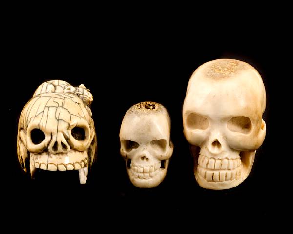 Appraisal: Three bone and ivory skull netsuke largest diameter in